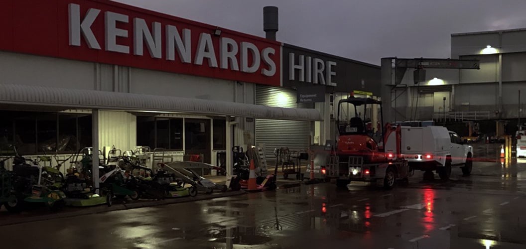 A Kennards Hire branch at night
